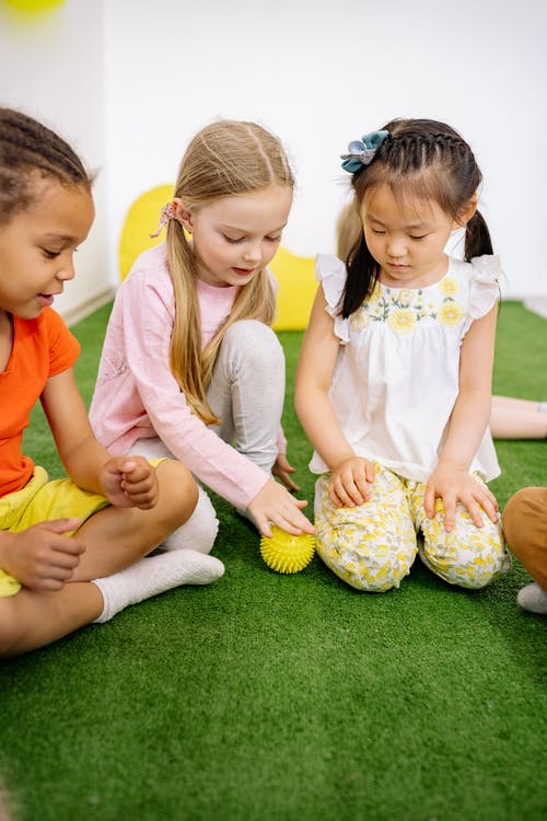 Three Friends Engaged in Playtime